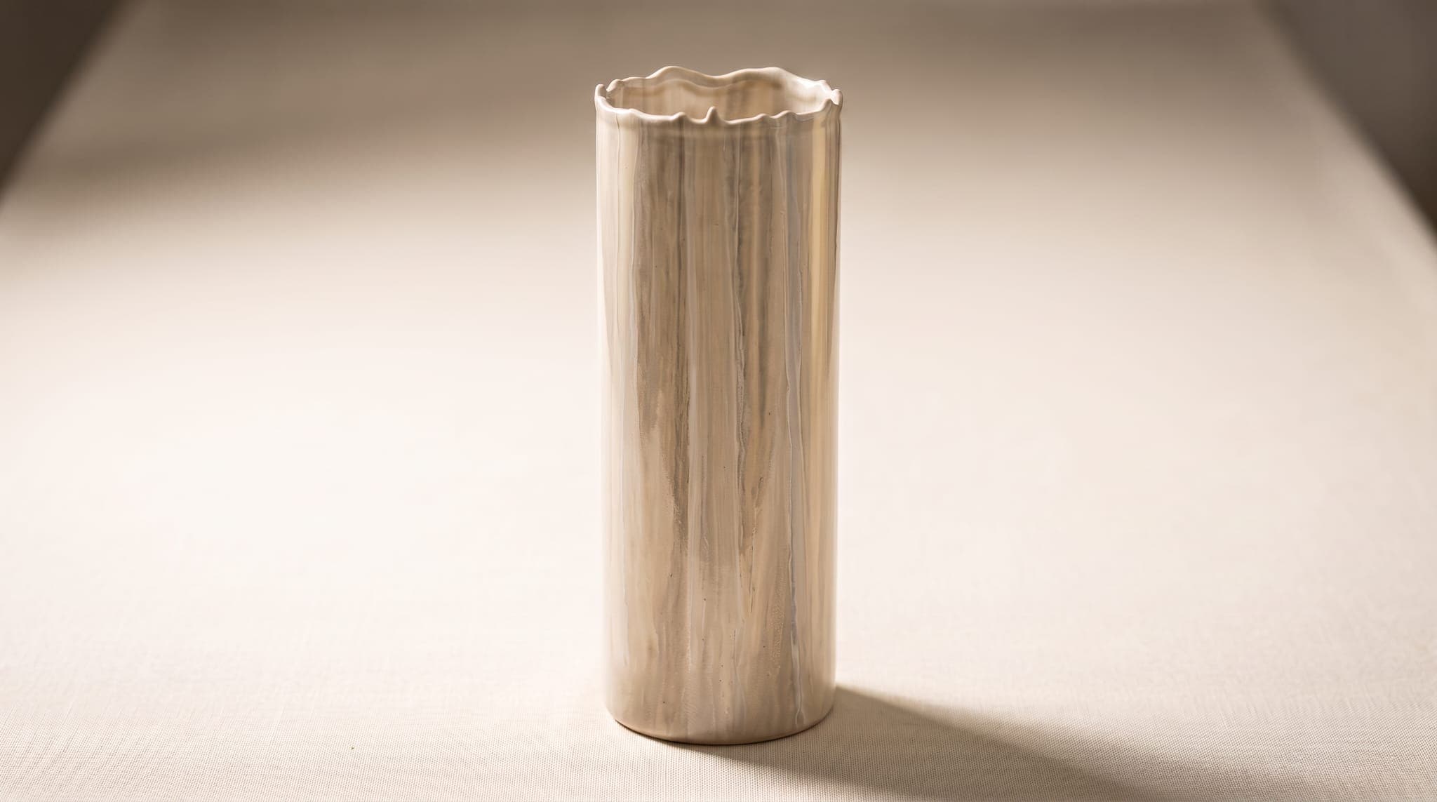 Neutral toned resin vase